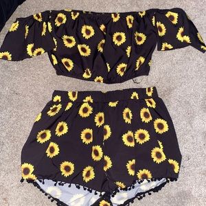 This is a two piece set. black with sunflowers. size XL